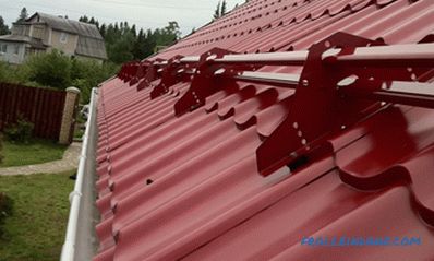 What is better metal or soft roof for the roof of a private house