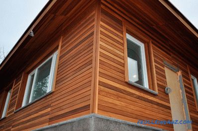 How to sheathe a wooden house outside - a review of materials