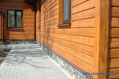 How to sheathe a wooden house outside - a review of materials