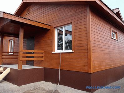 How to sheathe a wooden house outside - a review of materials